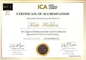 Photo of ICA certificate of Accreditation for Kate Holden has a double lined edge in gold and a gold with black seal centered below as well as a black square logo for BCI in the left top corner