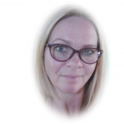 Head shot of counsellor Kate Crosson on white background which shows she has long blond hair and wears black framed spectacles. She is smiling